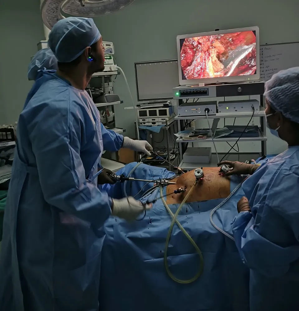 Keyhole ports and the laparoscopic camera view on the theatre monitor